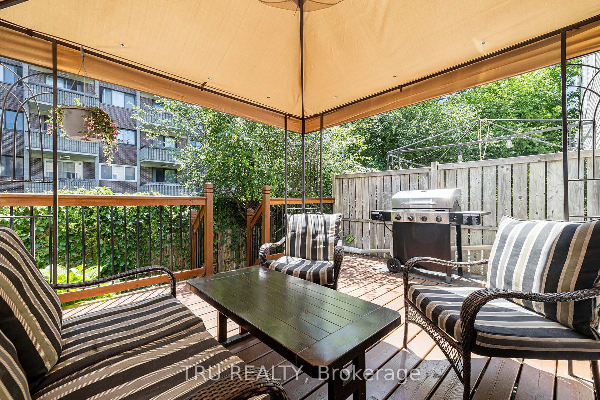 Private backyard with deck and gazebo