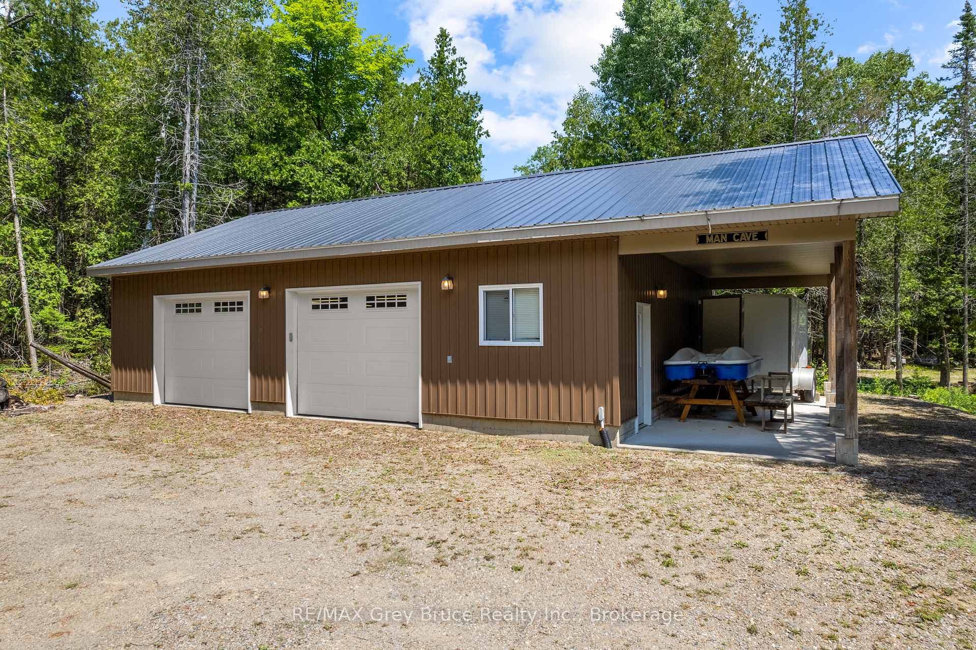 30 ft. X 40 ft. Detached garage with carport