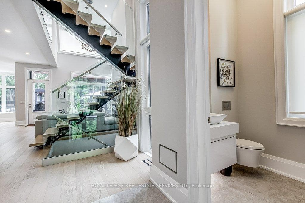 Custom Glass Railings and floating Staircases