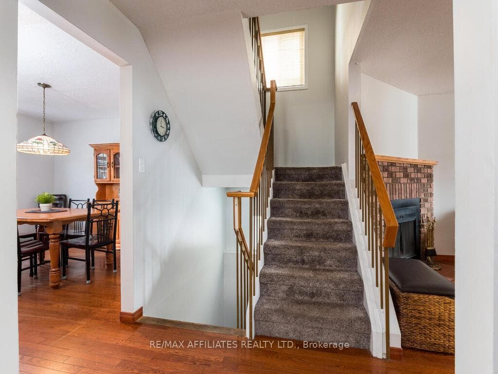 Stairs up to Bedrooms, down to Finished Basement