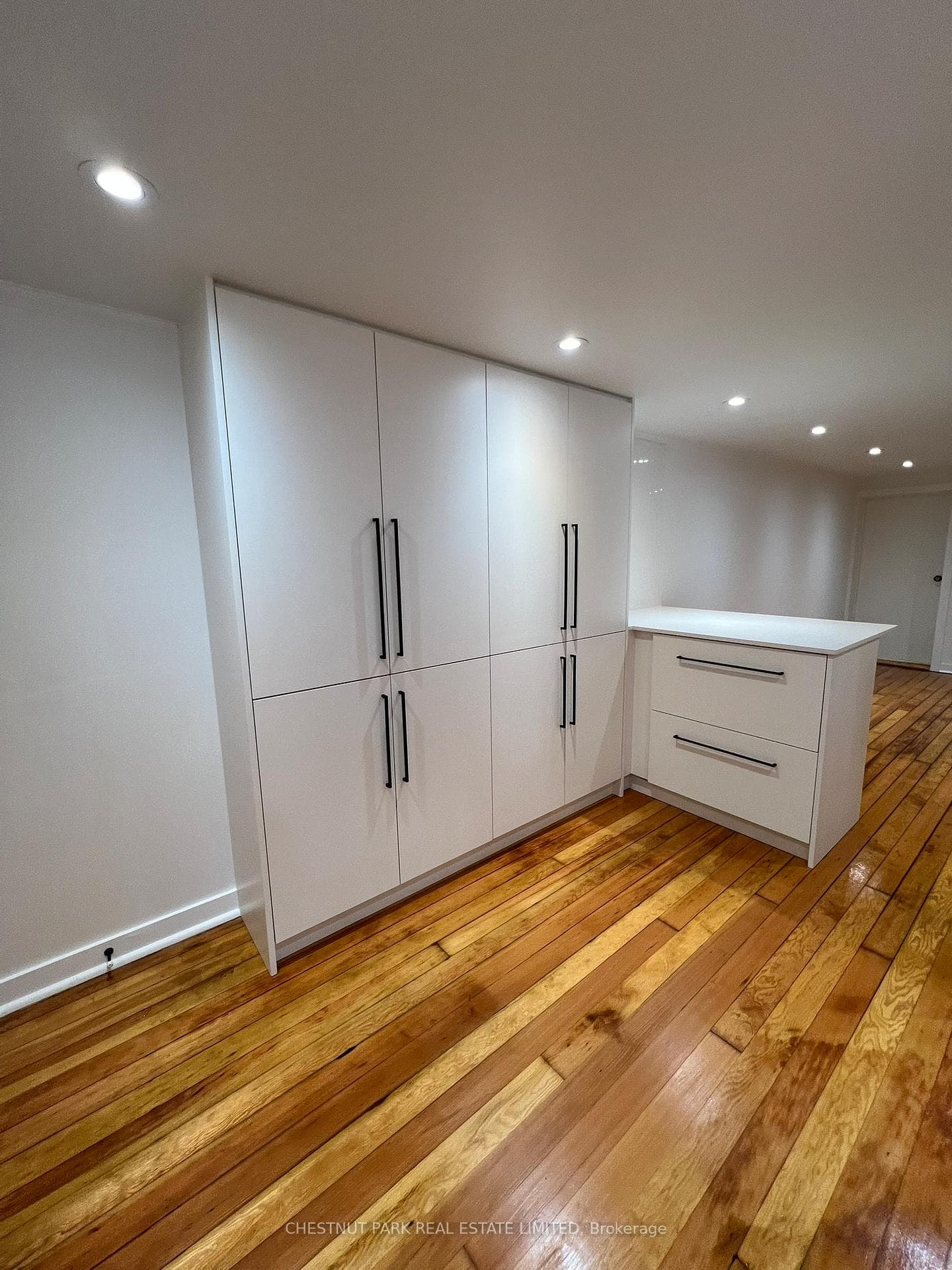 Several cupboards for storage + eating counter.