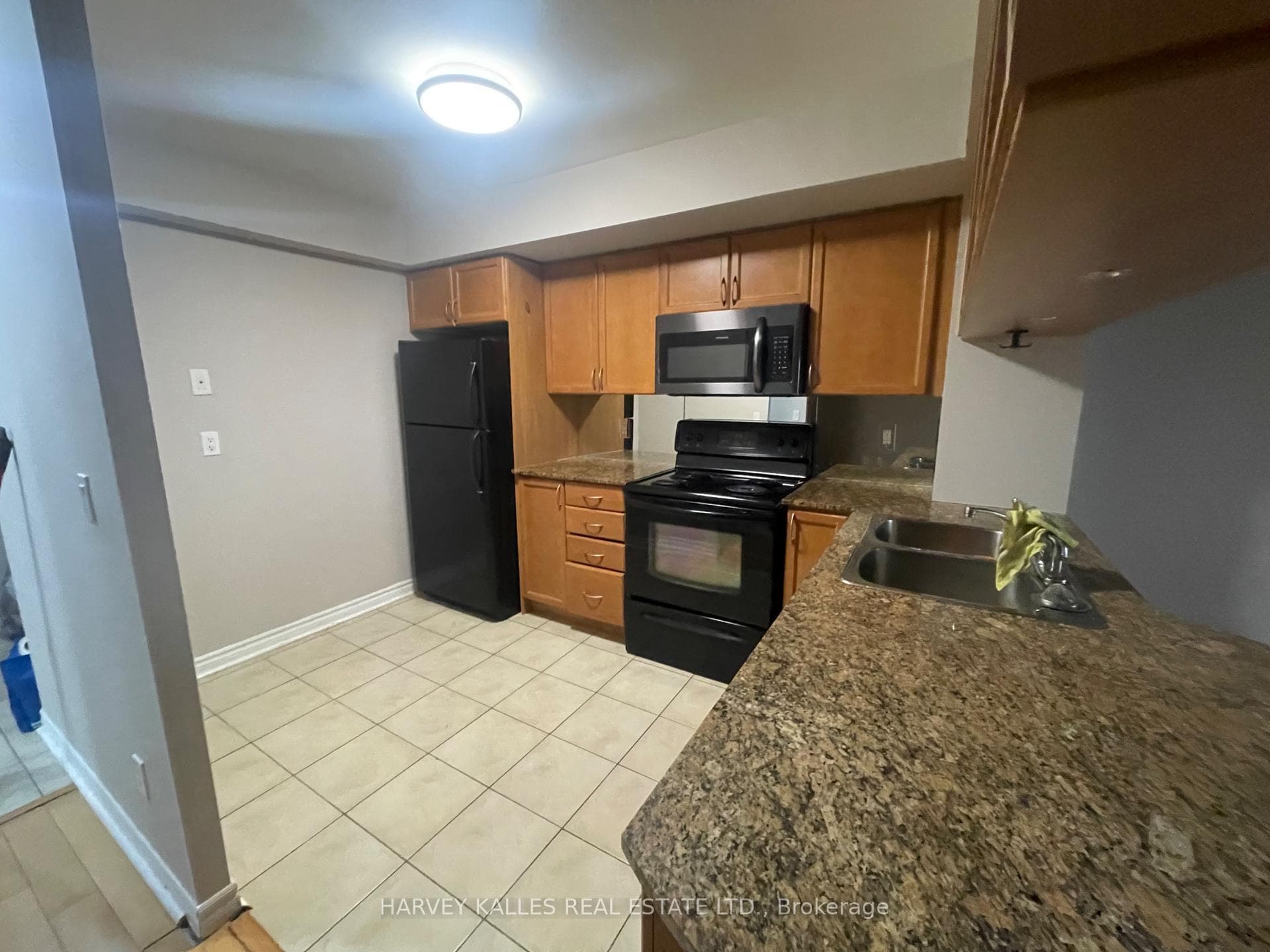 Very spacious kitchen with breakfast bar.