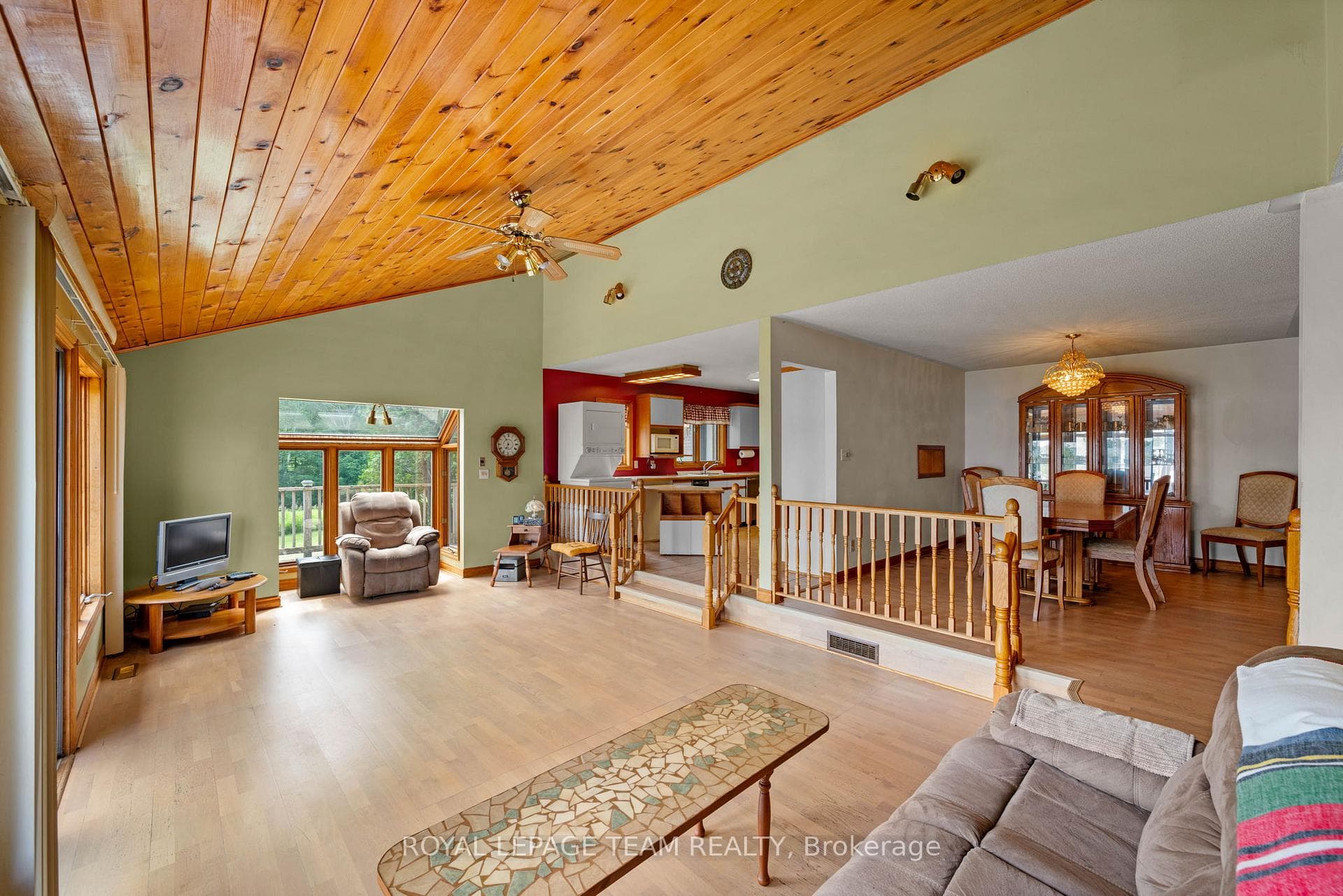 Living room with view to kitchen and dining room