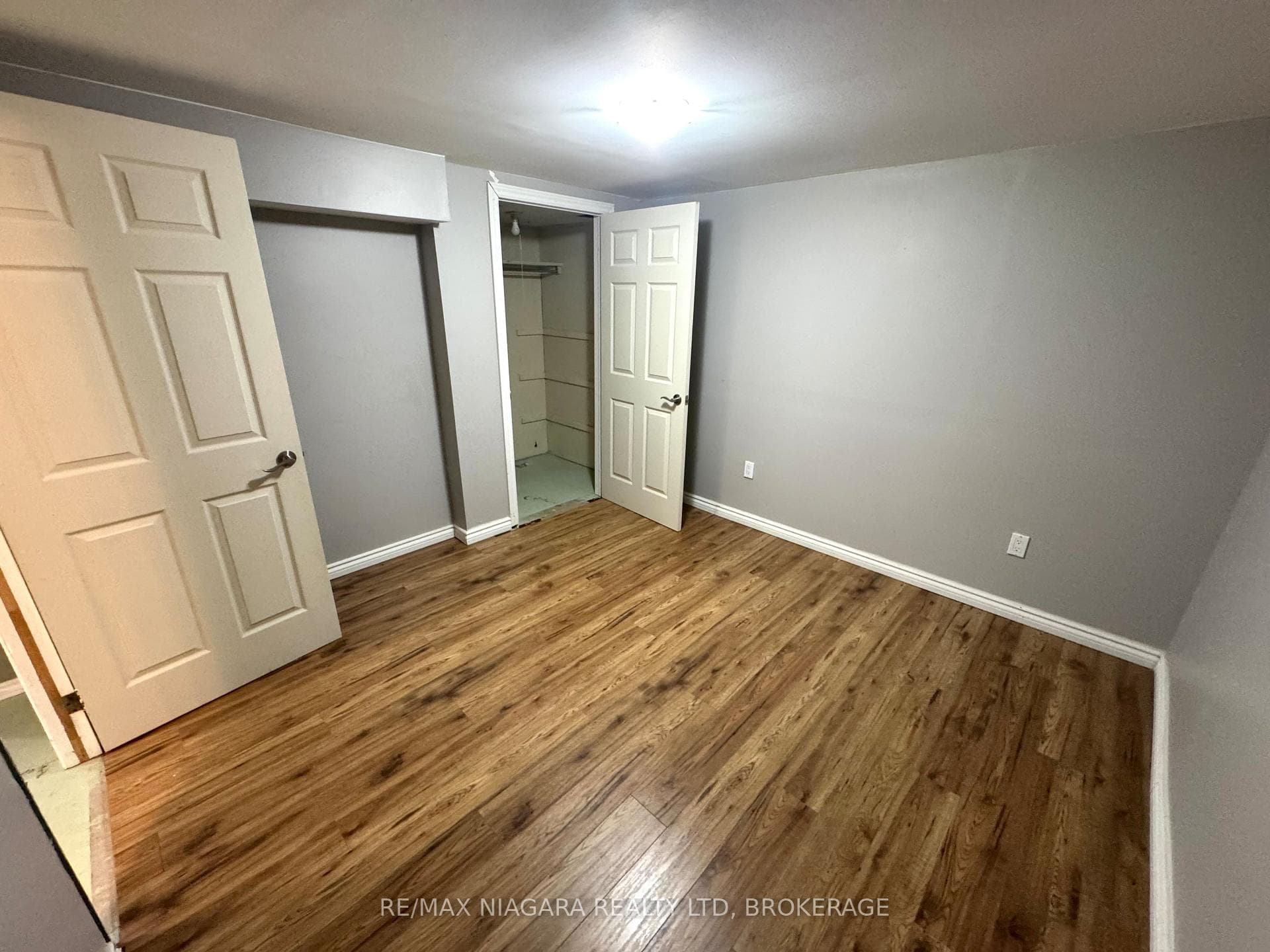 Den with door and closet
