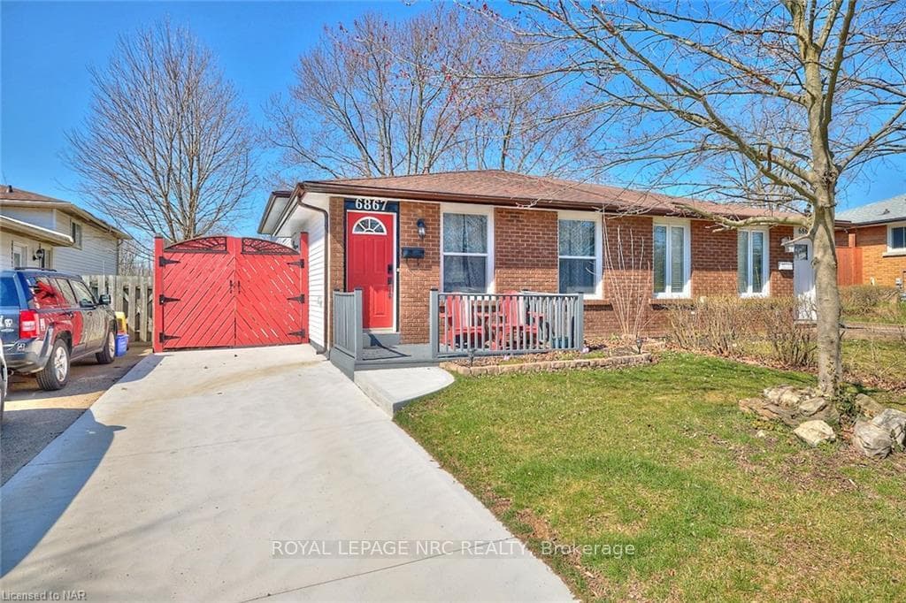 6867 Waters Avenue photo 1