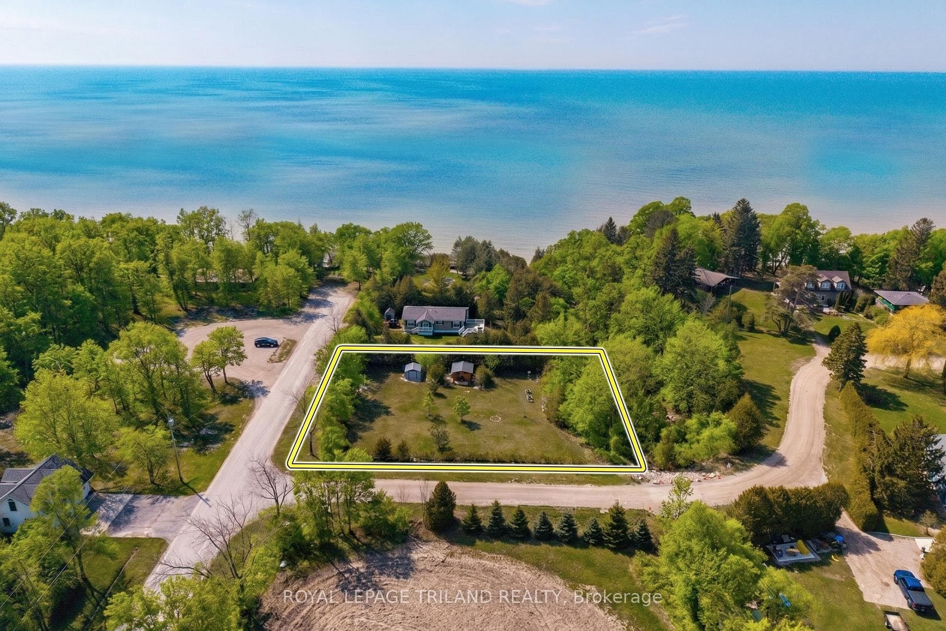 Impressive .4 acre building lot steps to beach.