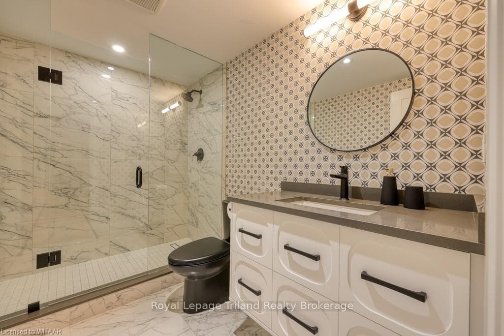 Striking 3 piece lower level bath.