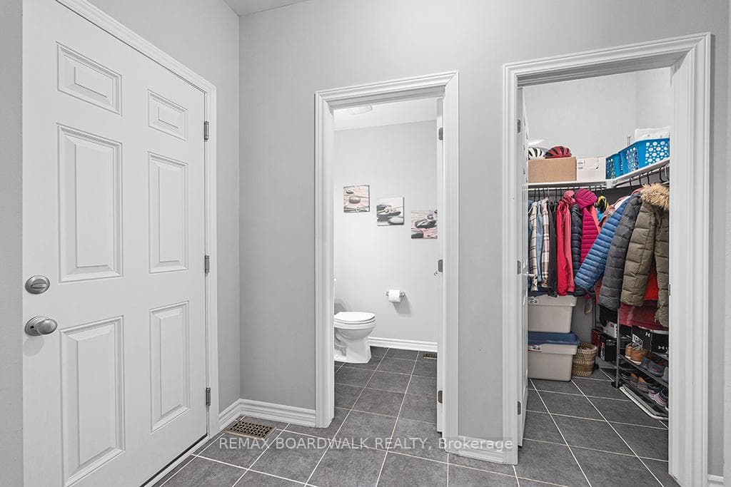 Powder room in the mud room area...