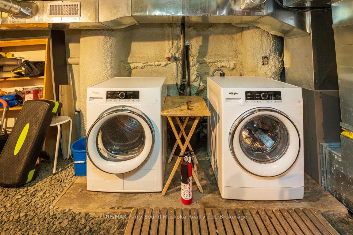 Lower level laundry; Spray foamed basement level