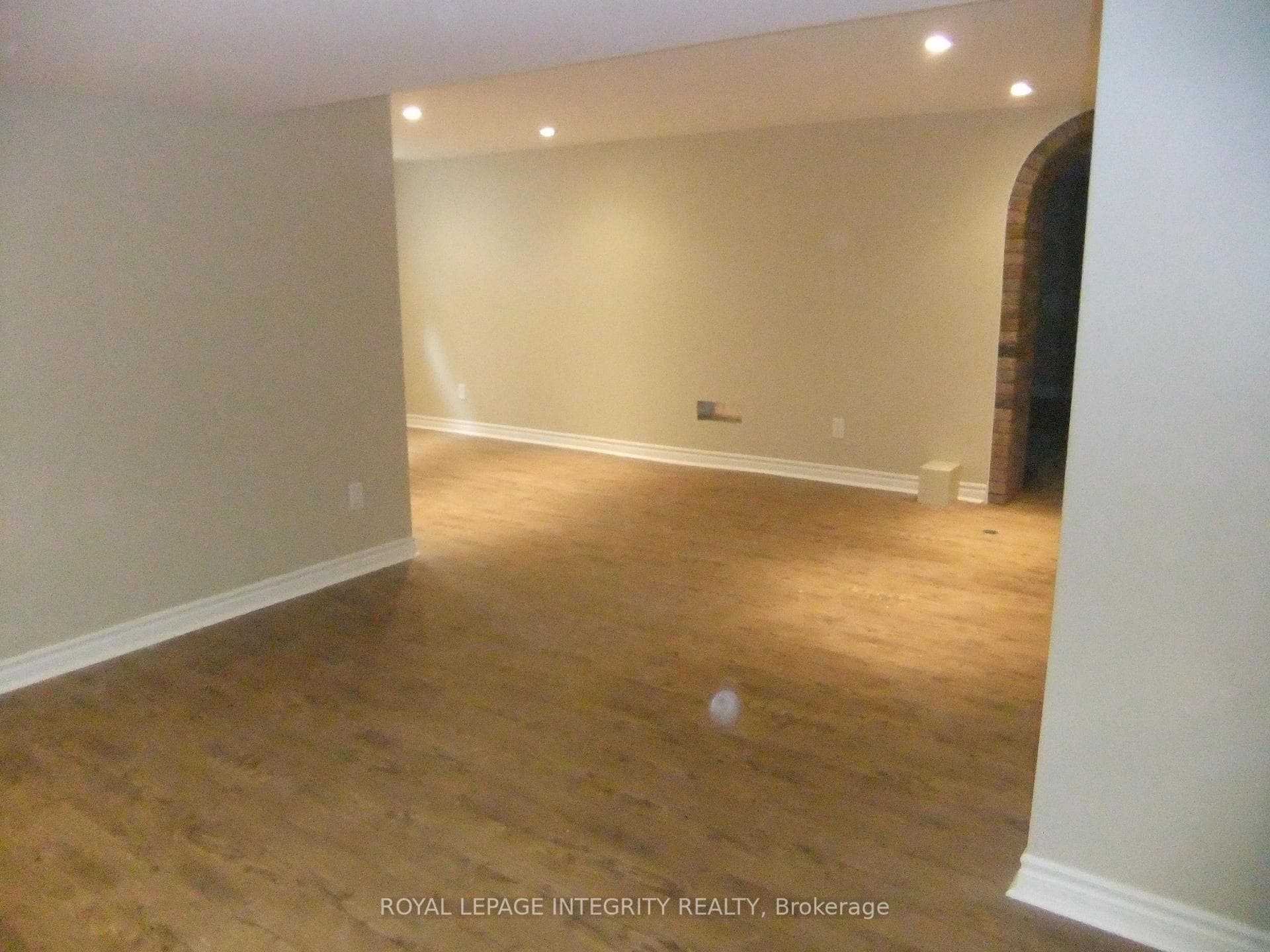 view from basement kitchen towards living/dining