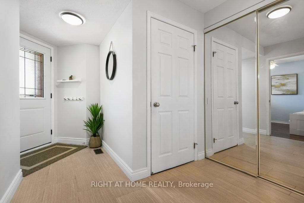 foyer with door to laundry and garage access
