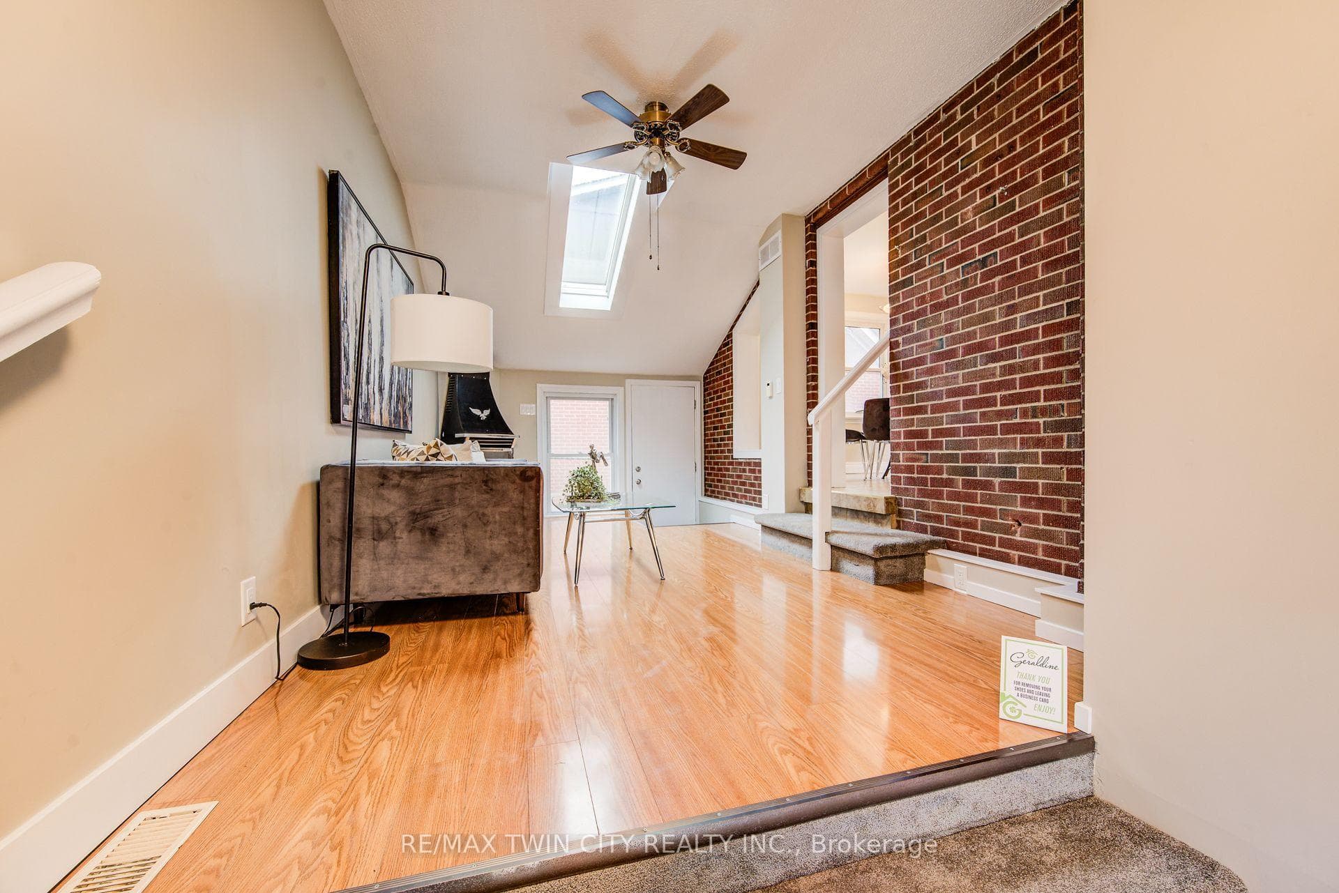 Family room with heated flooring & skylight
