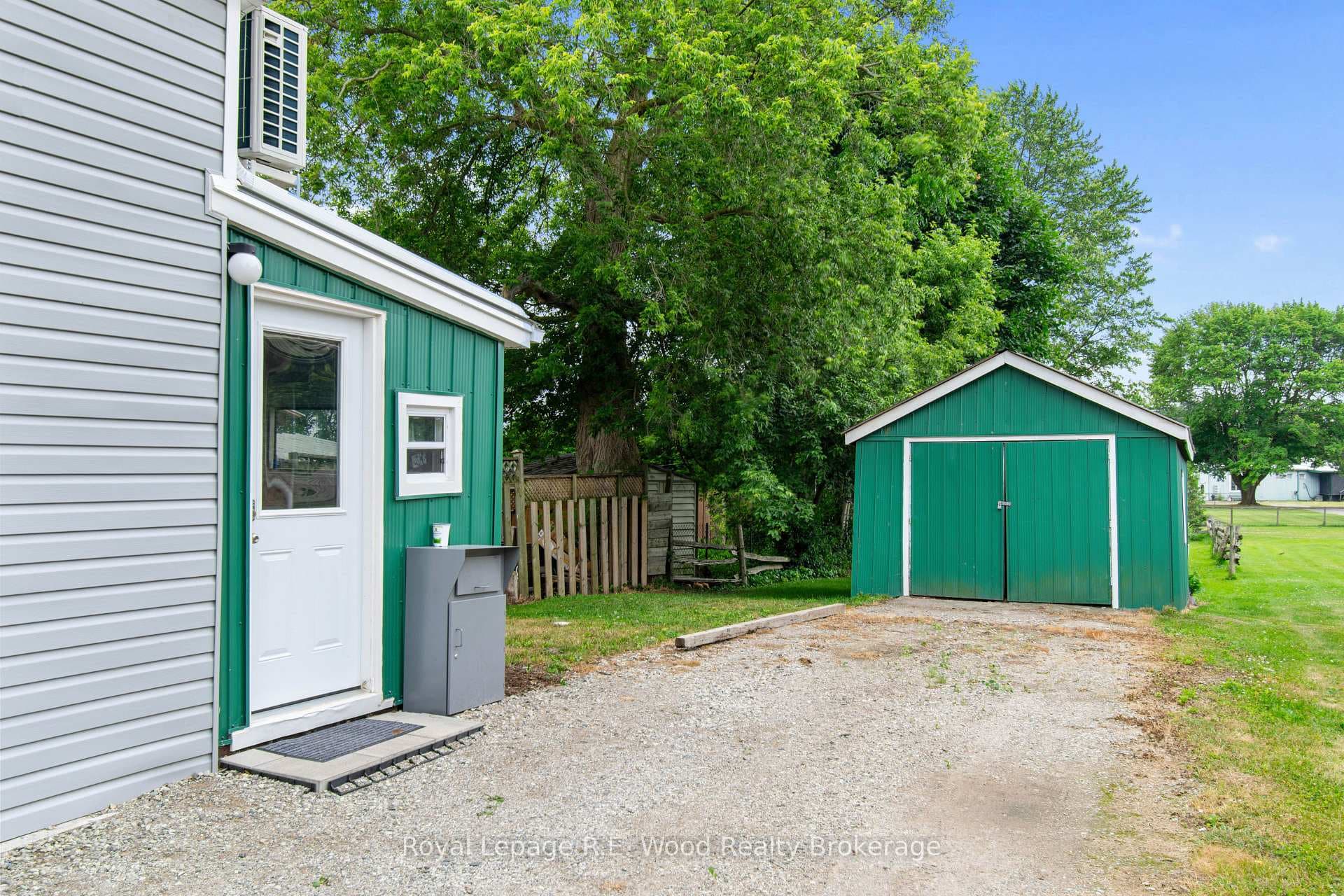 Separate rear entrance to Main Floor unit + shop.
