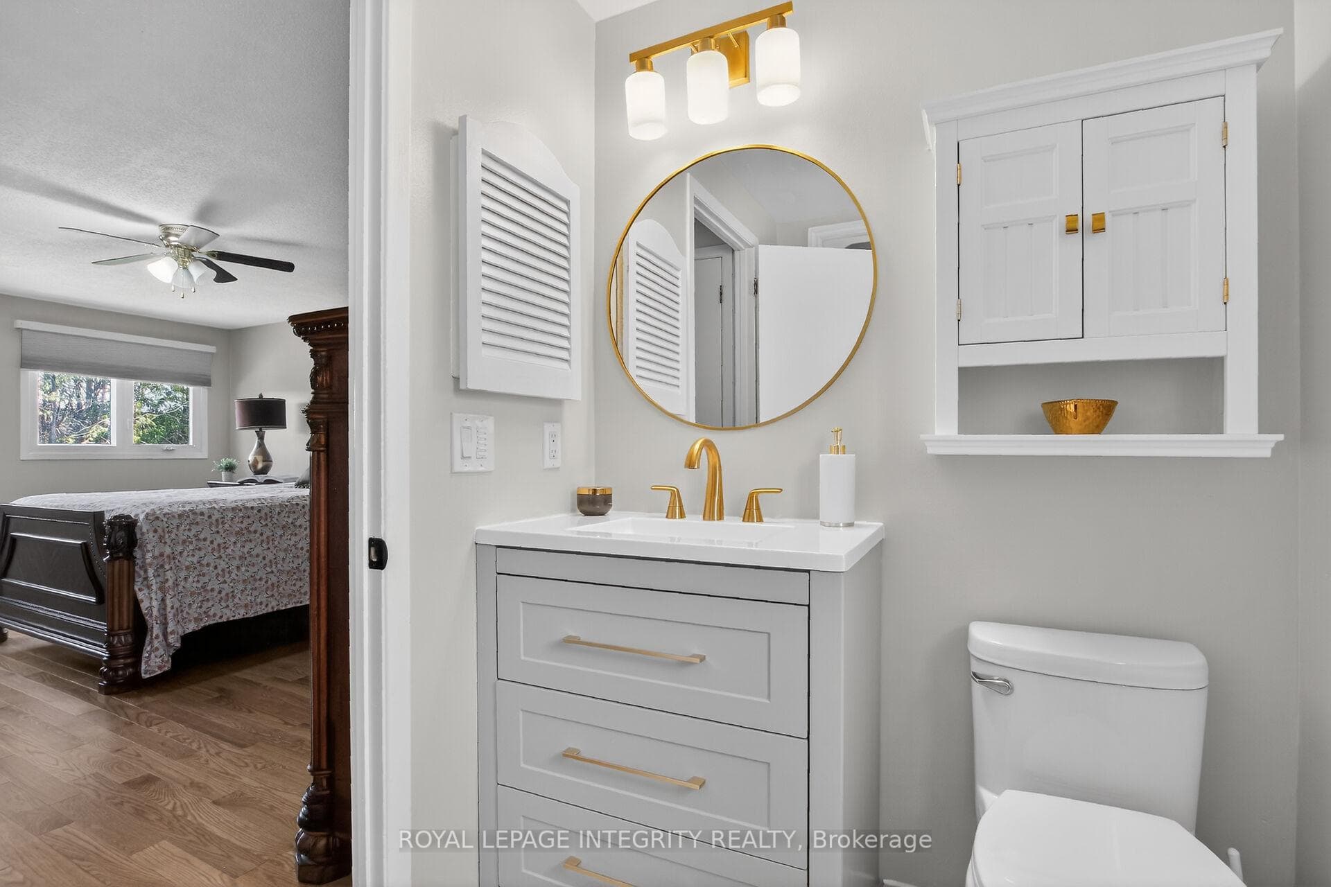 Updated ensuite with stylish brass accent