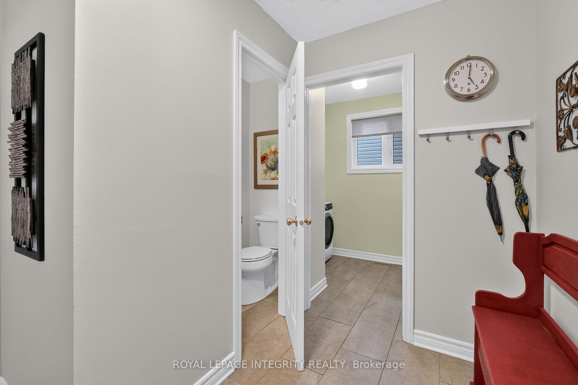 Entrance to garage, powder rm and laundry