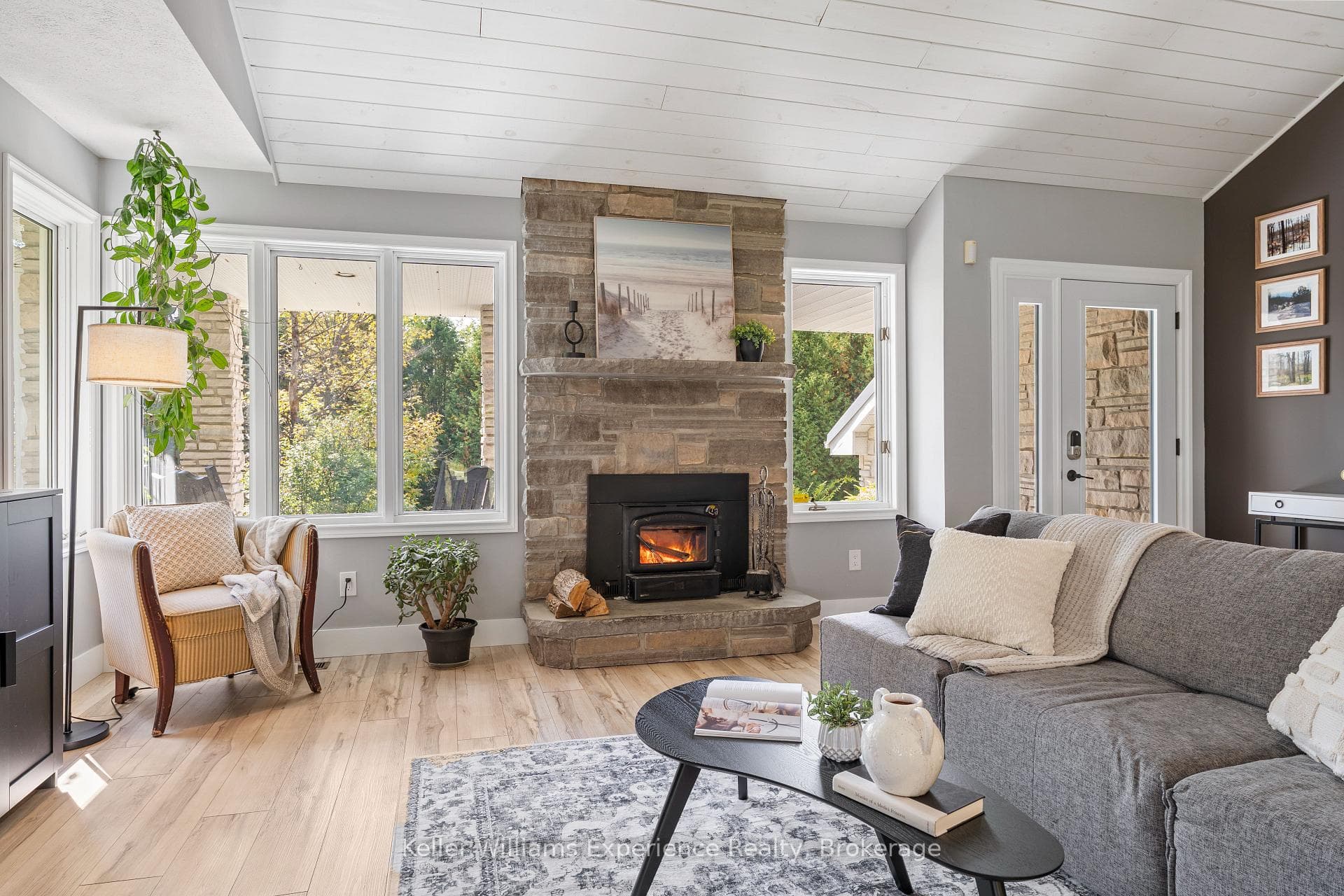 Floor-to-Ceiling Stone Wood-Burning Fireplace