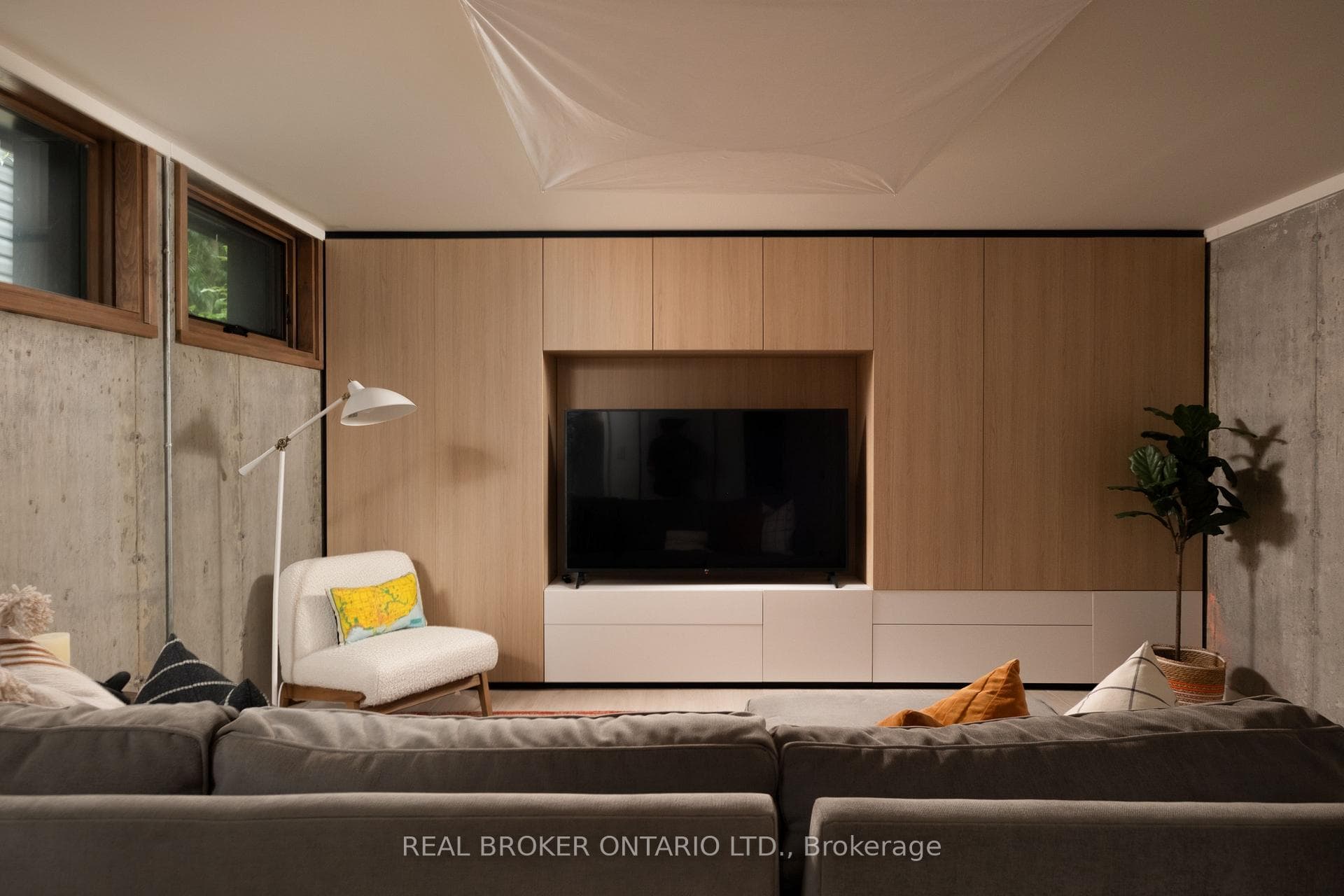Lower level media room with bathroom & laundry rm