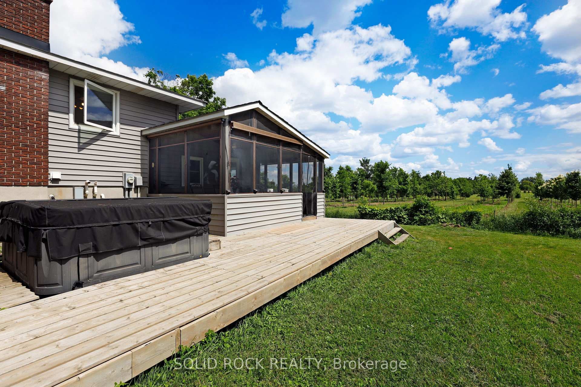 Hot Tub and screened in porch
