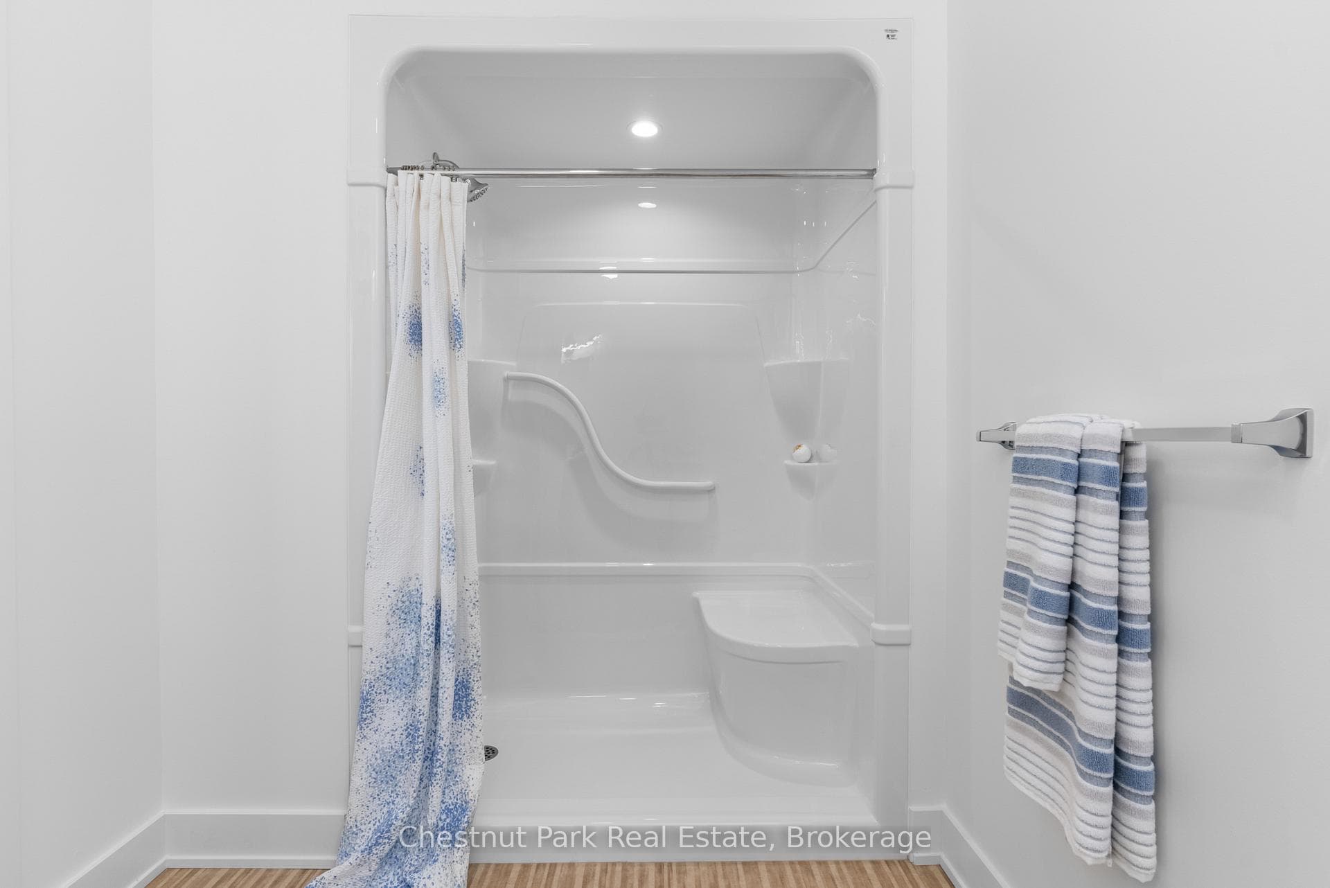 Walk-In Showers Feature Grab Bars and Seats