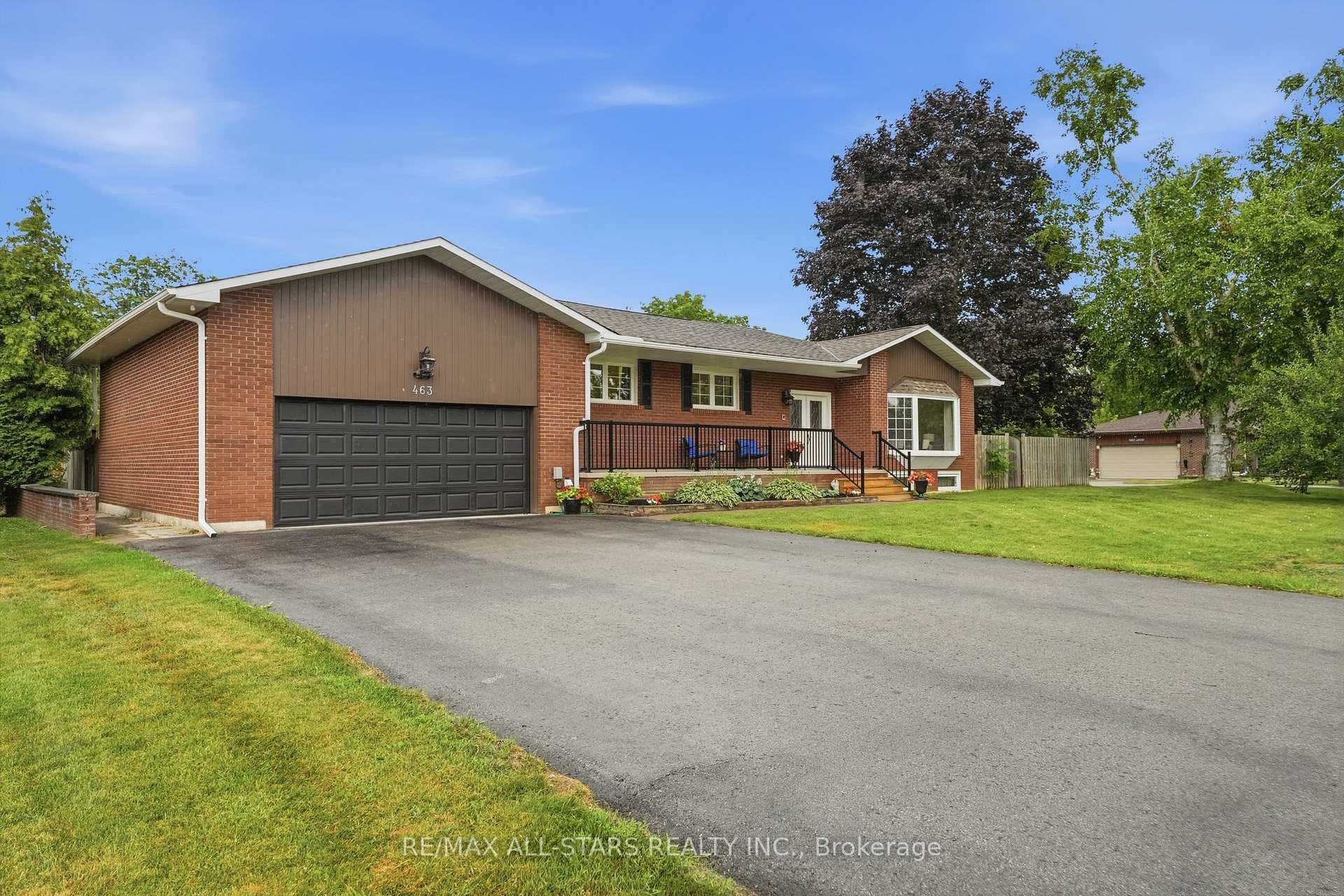 Spacious paved driveway fits 6-8 vehicles