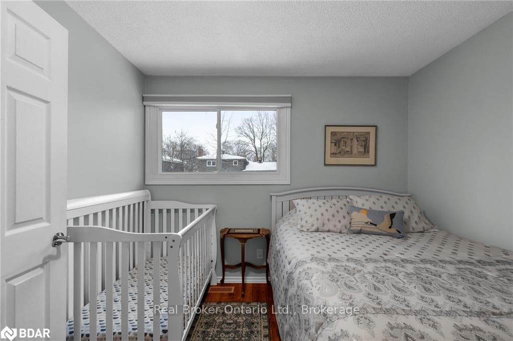 Bedroom featuring hardwood / wood-style floors and