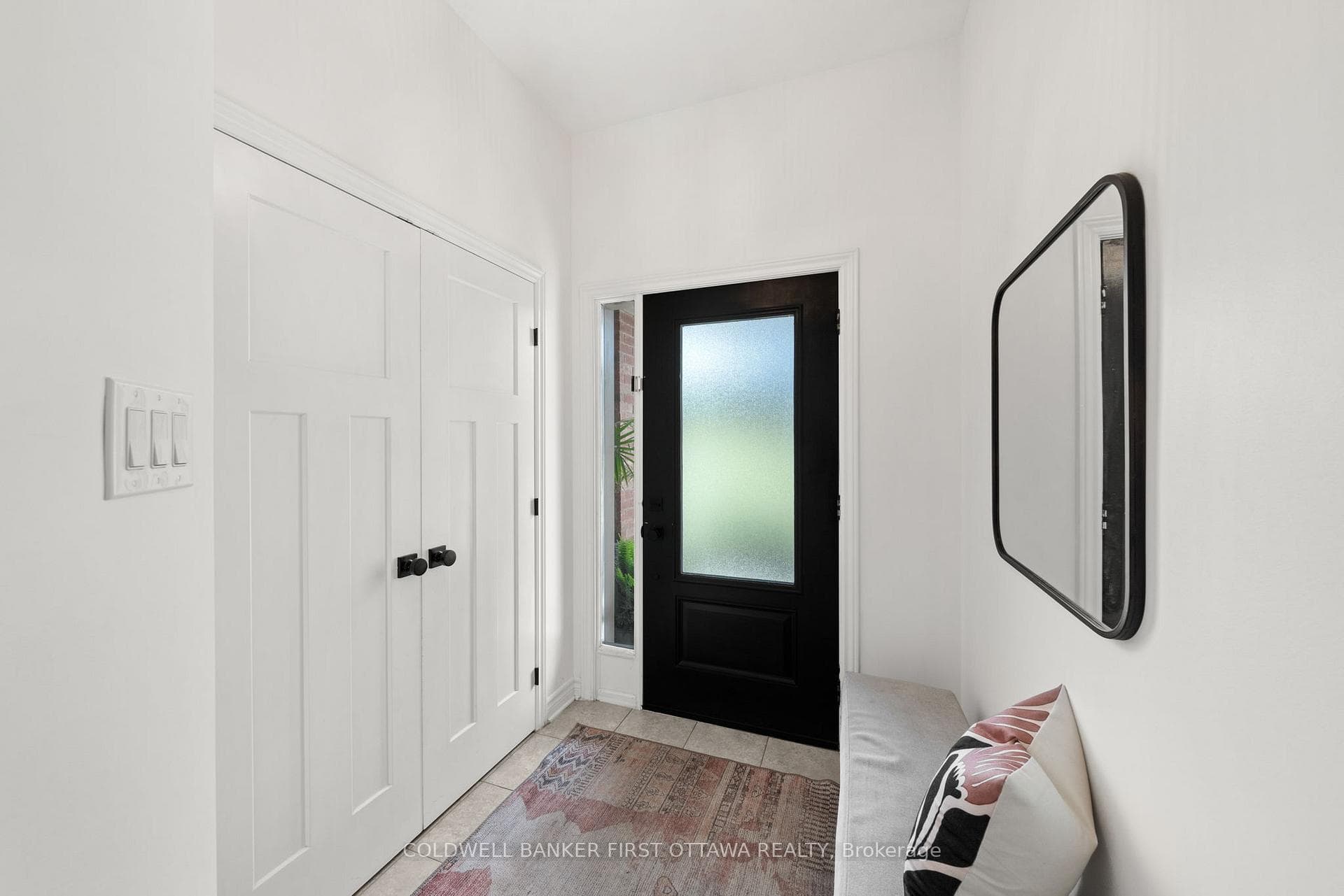 Welcoming front foyer w double closet.
