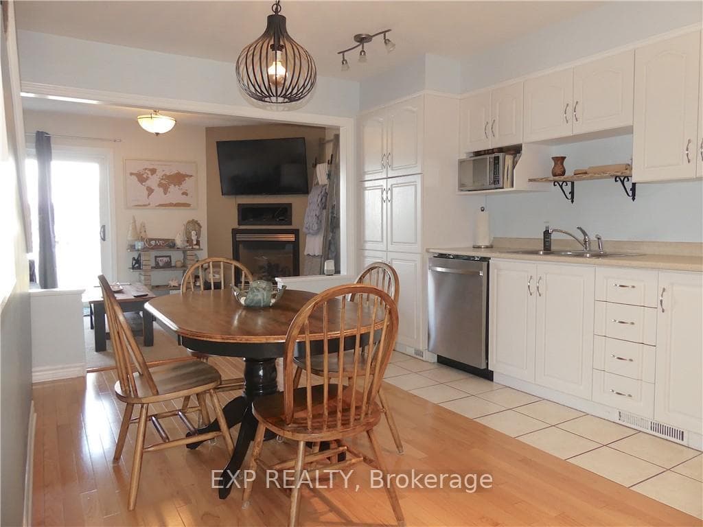 Hardwood floor in dining area. A great view of th