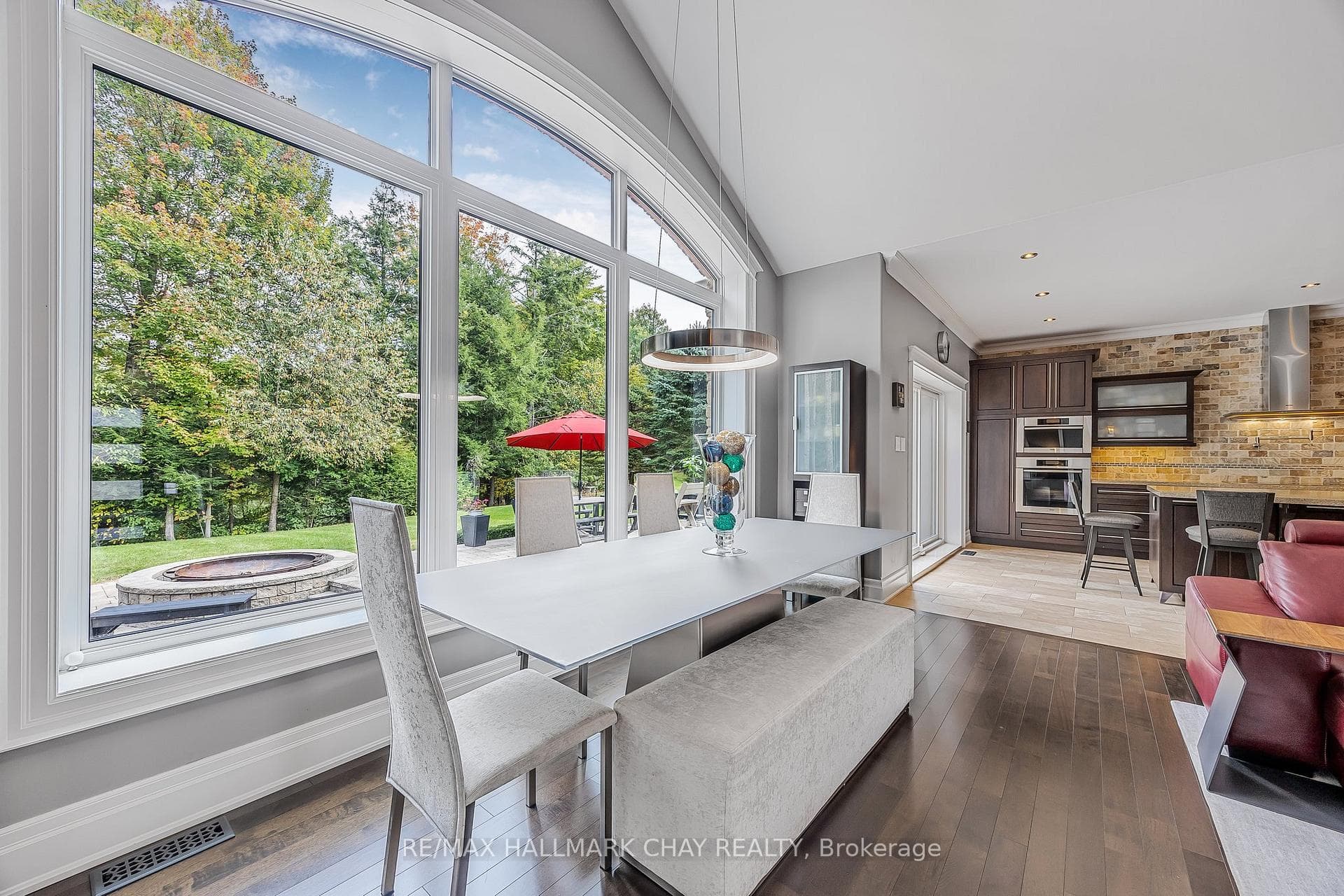 Large window overlooking backyard from Dining room