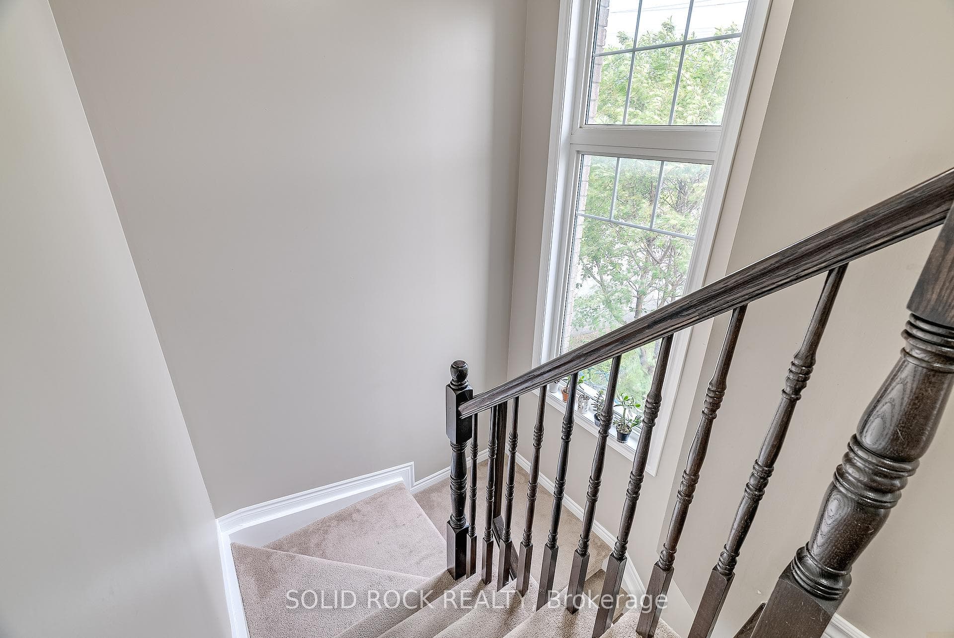Corner stair windows bring in plenty of light