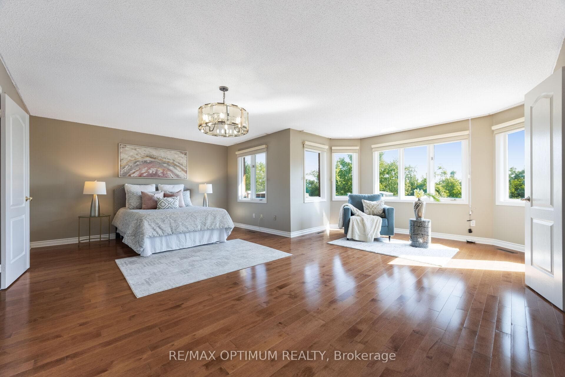 Luxurious primary suite with sitting area