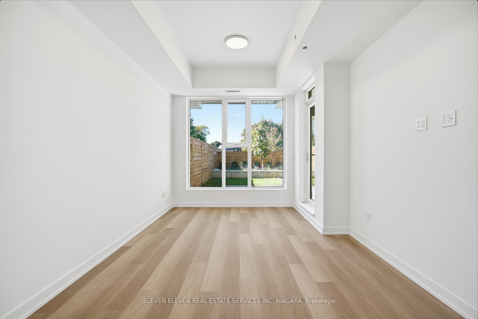 Living Room walk-out to Patio and Garden.