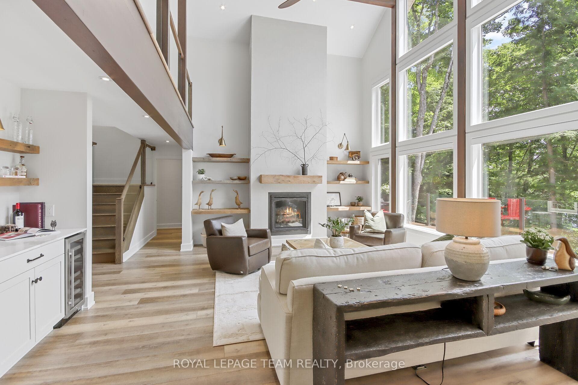 bar area, fireplace, custom built-in shelves