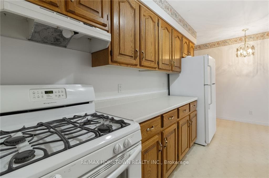 Kitchen equipped with natural gas stove, fridge an