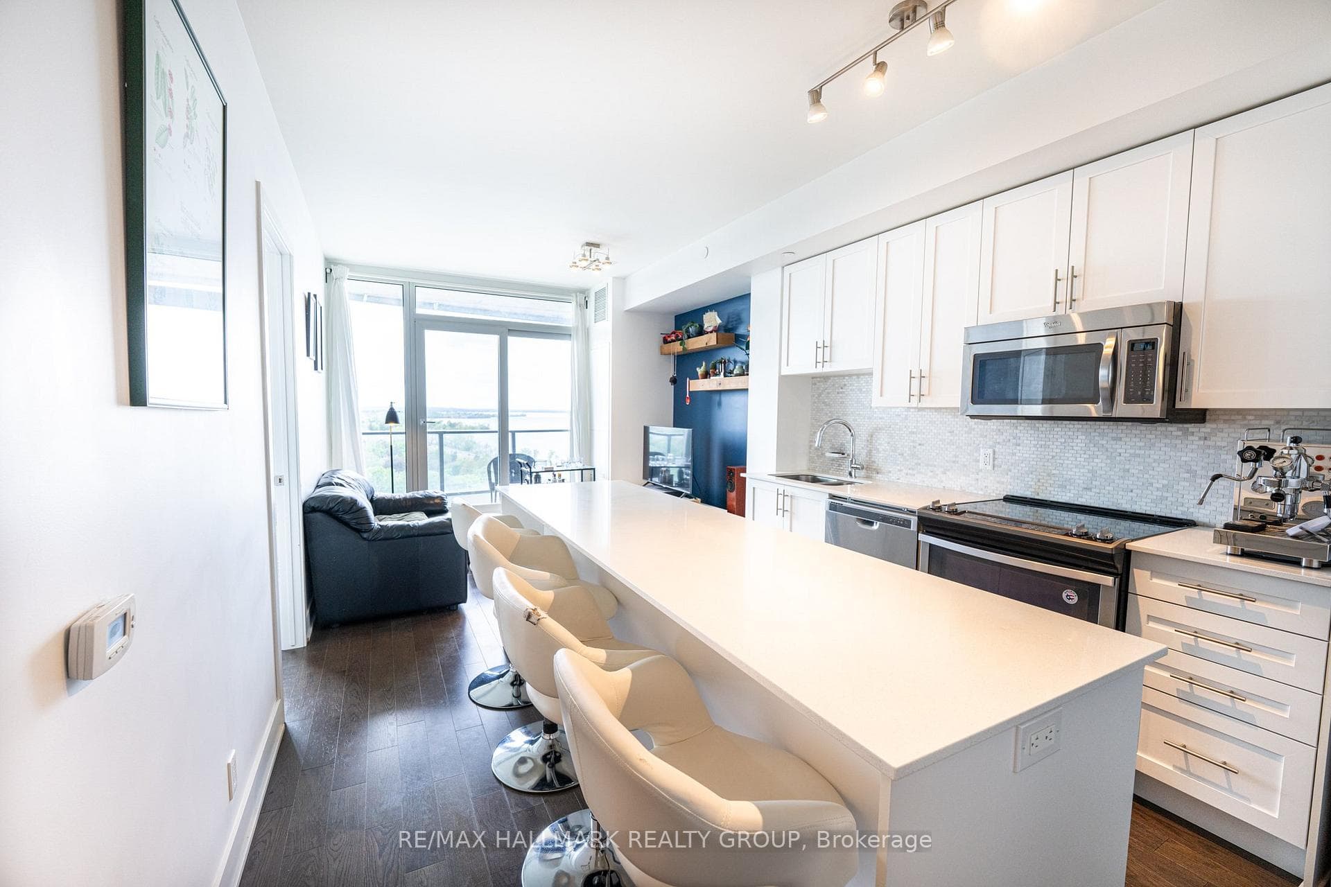 Kitchen w/Quartz Island & Counter & SS Appliances