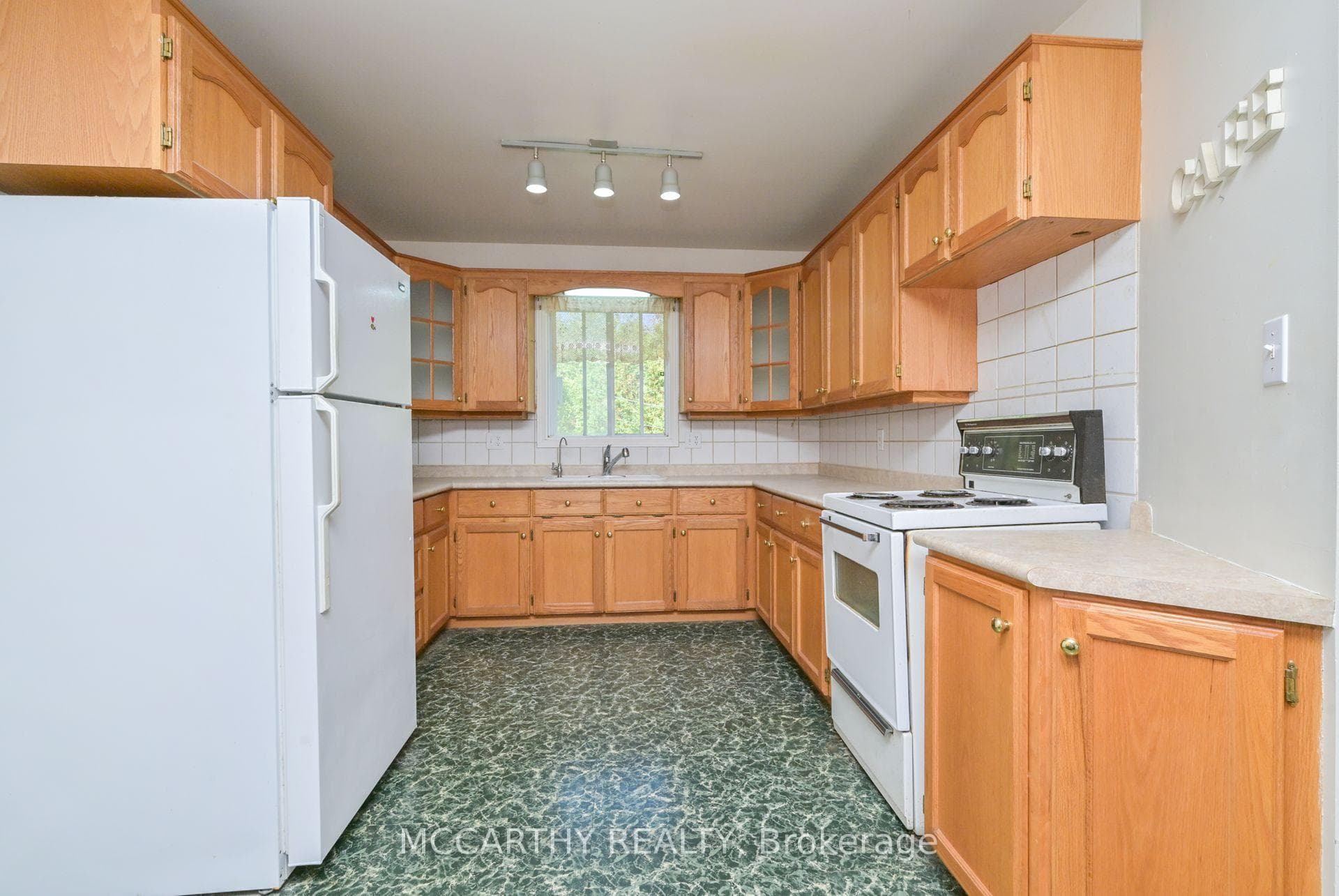 Plenty of cabinets, newer floor see later photos