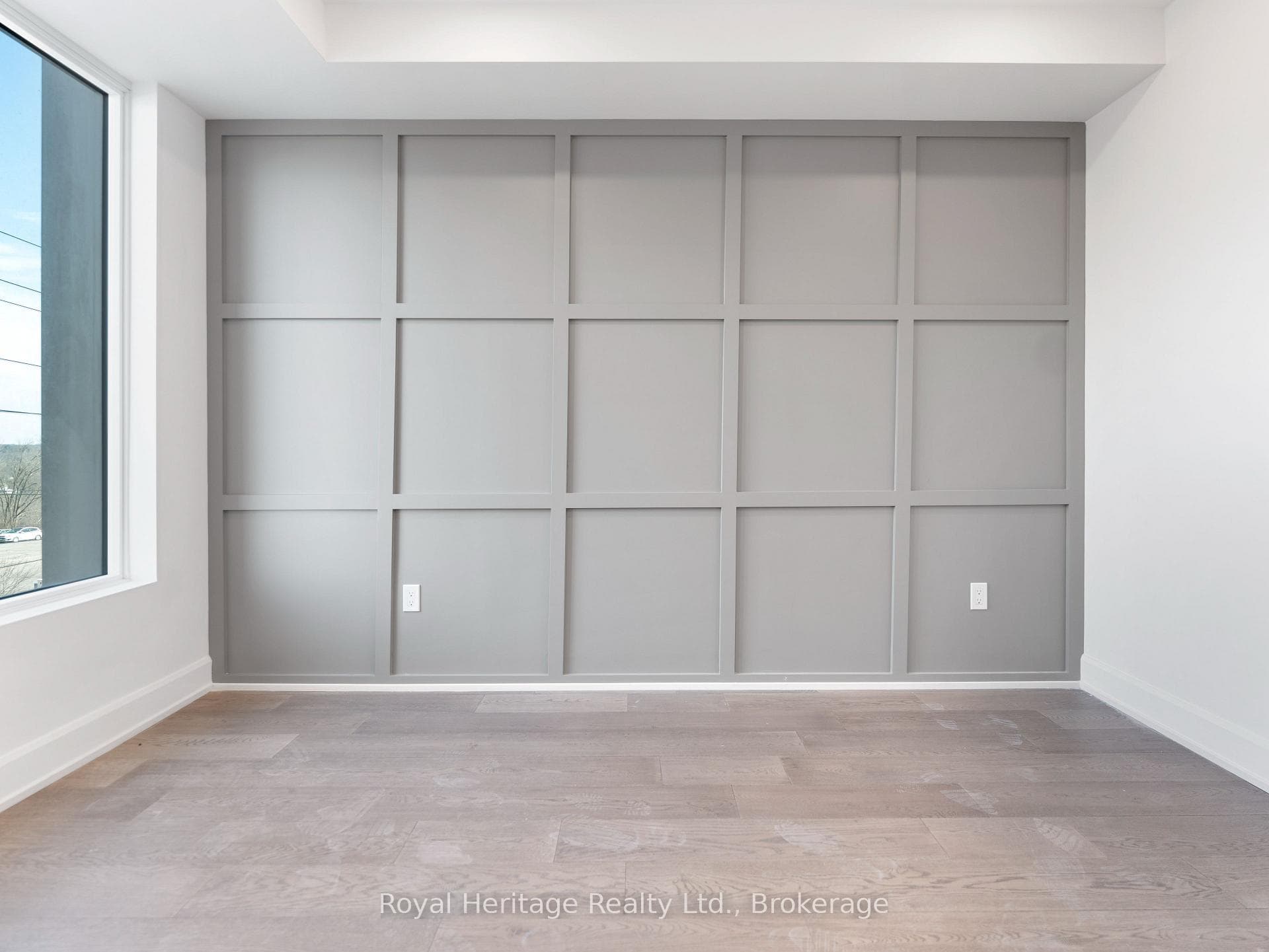 Primary bedroom - grey panel wall