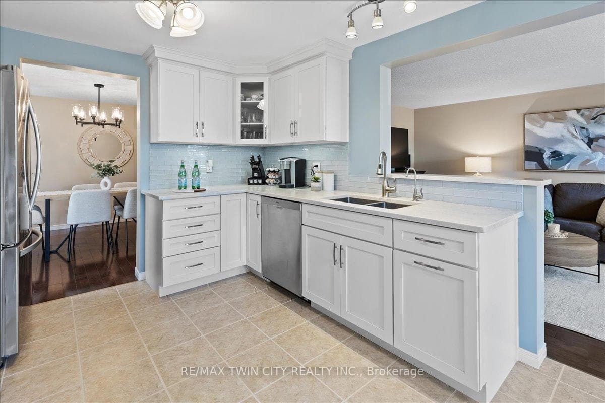 Quartz countertops, filtered water, and glass tile