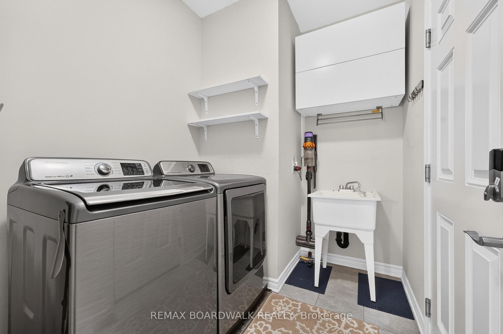 Main Floor Laundry Room w/Garage Access
