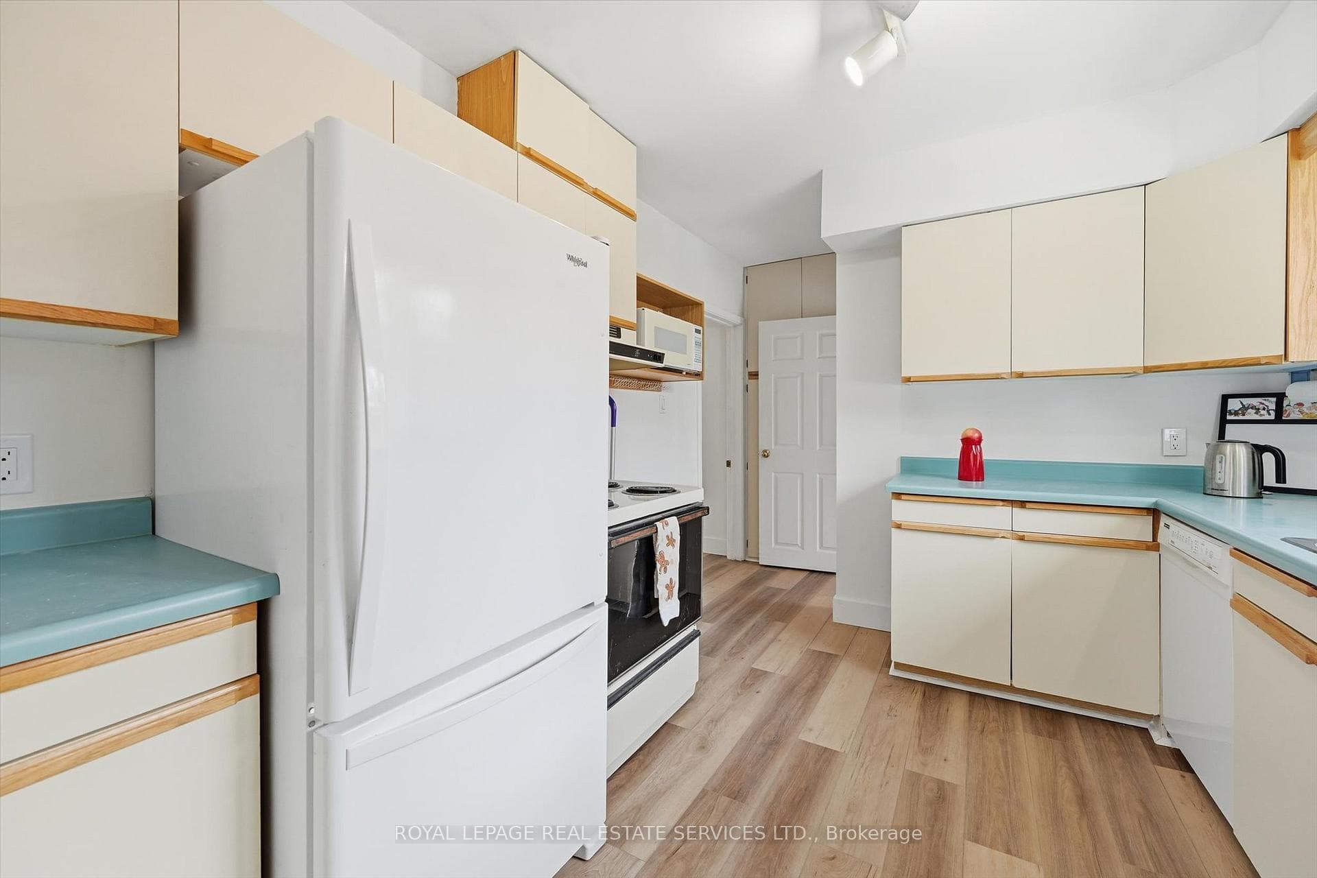 Luxury Wide-Plank SPC Vinyl Flooring in Kitchen
