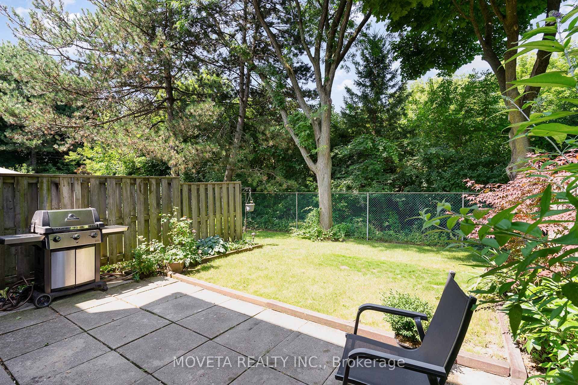Serene Yard Backing onto Ravine and Trails