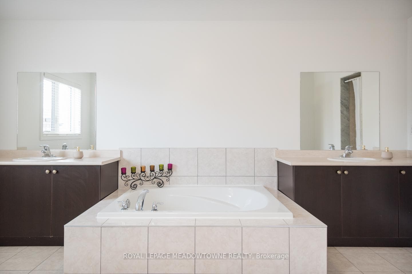 Two individual vanities plus soaker tub