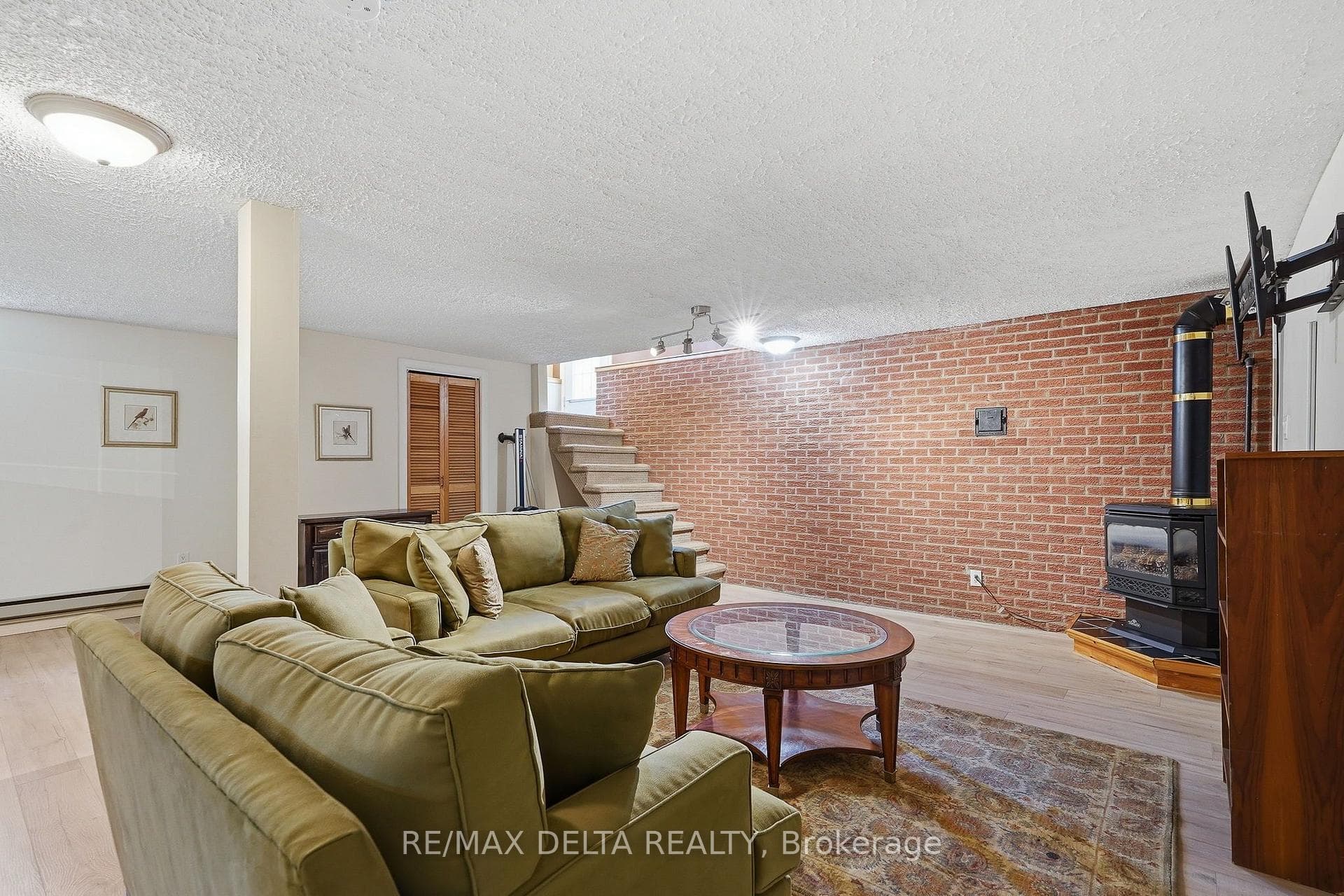 Natural gas fireplace in basement.