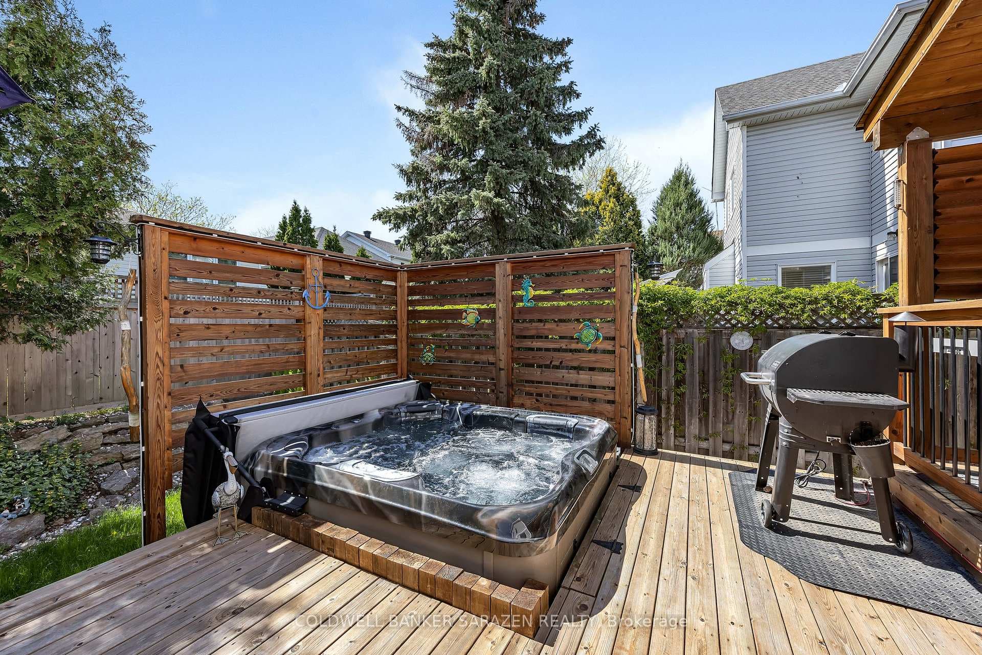 Large deck with hot tub - & privacy screens