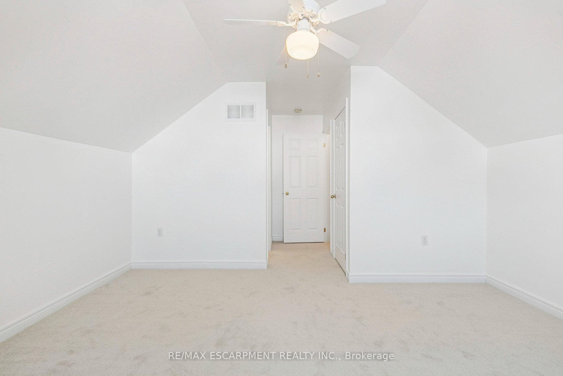 Loft level bedroom with walk-in closet
