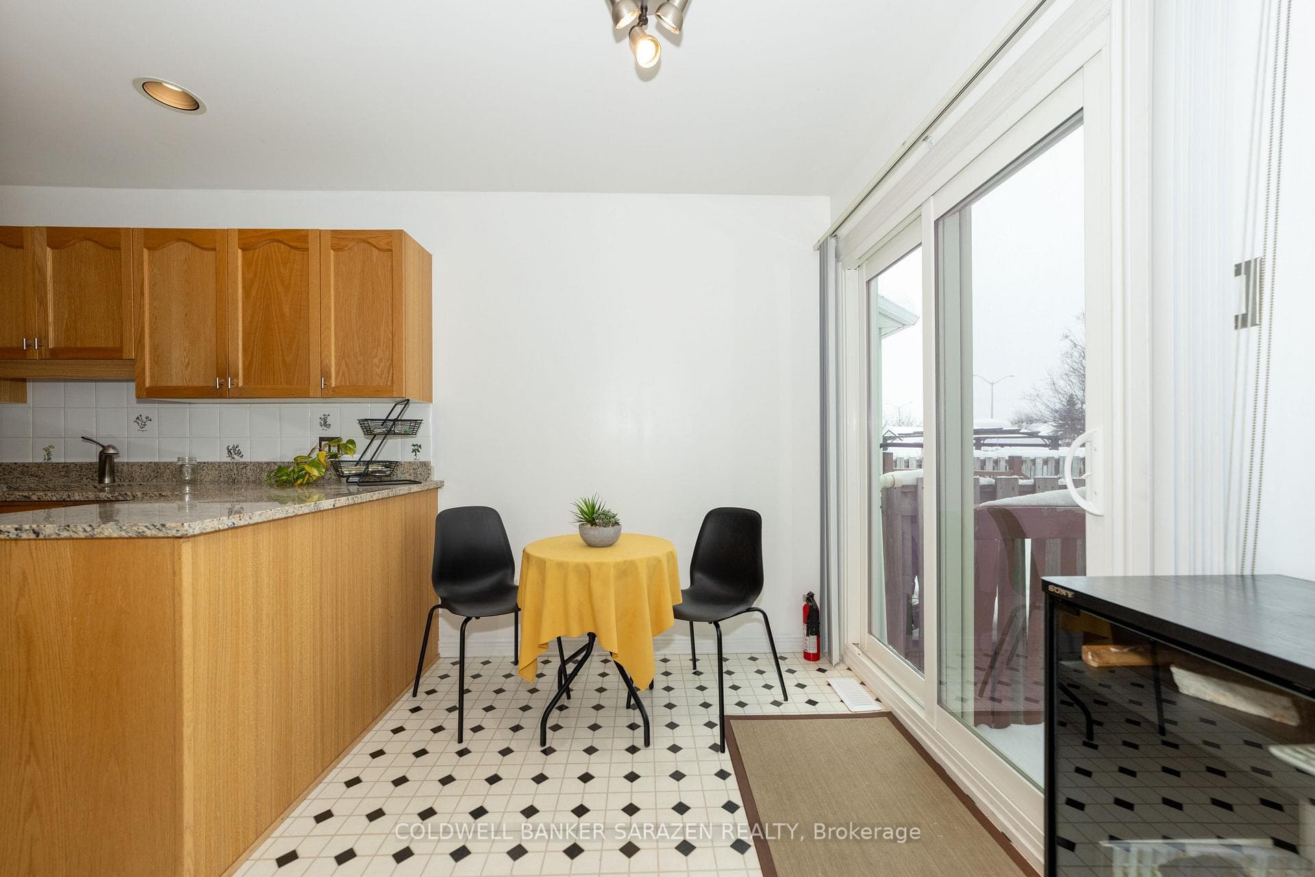 Eat-in kitchen-granite counters -ss appliances