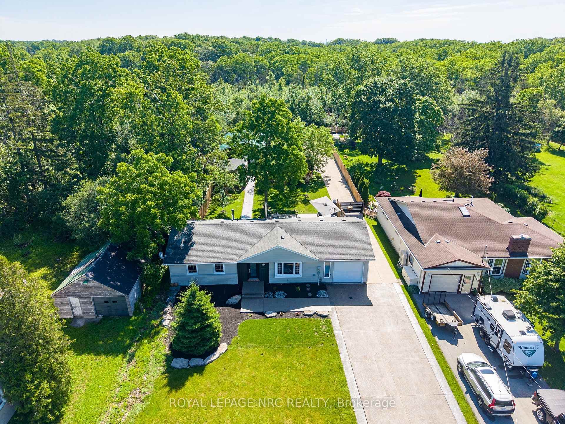 Prepare to be wowed by this half-acre paradise!