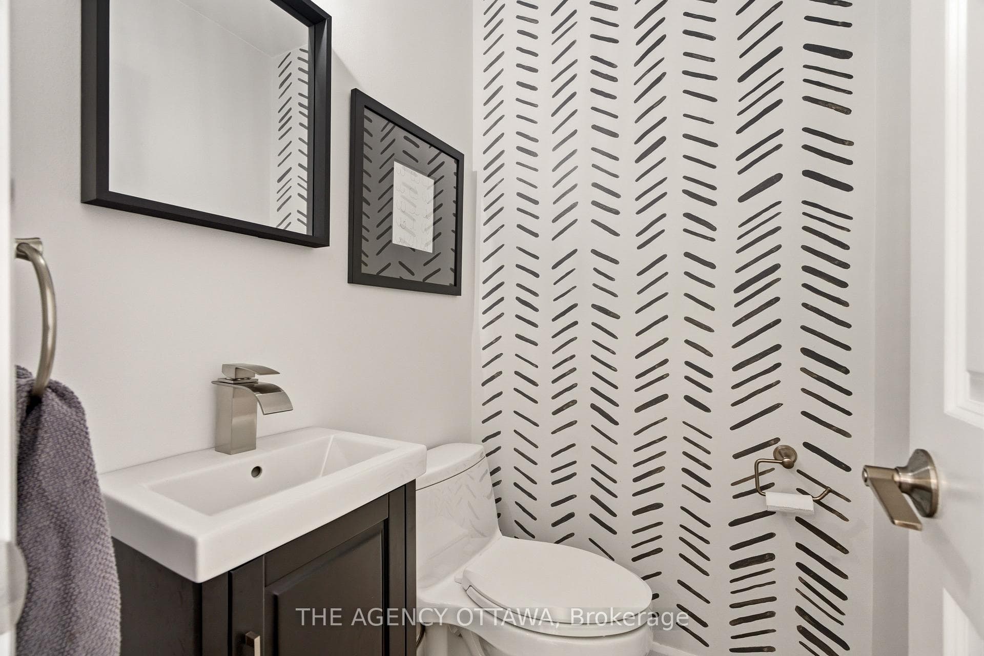 Stylish powder room with modern vanity