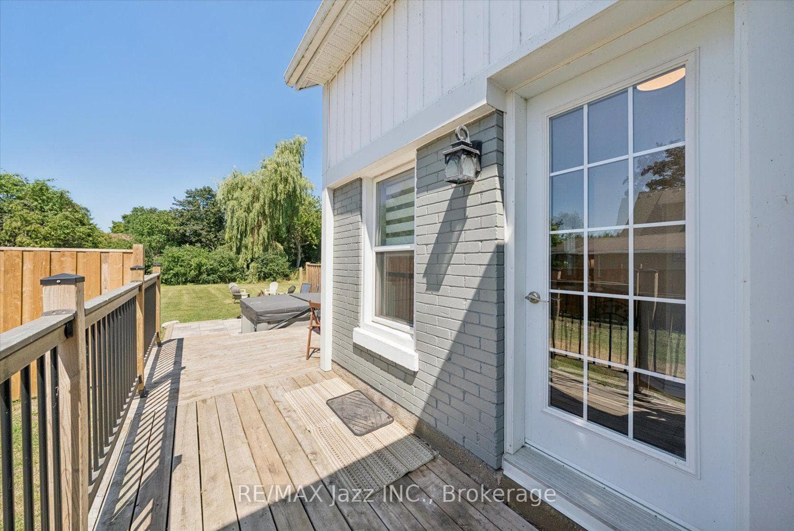 Walkout from kitchen to large deck and backyard