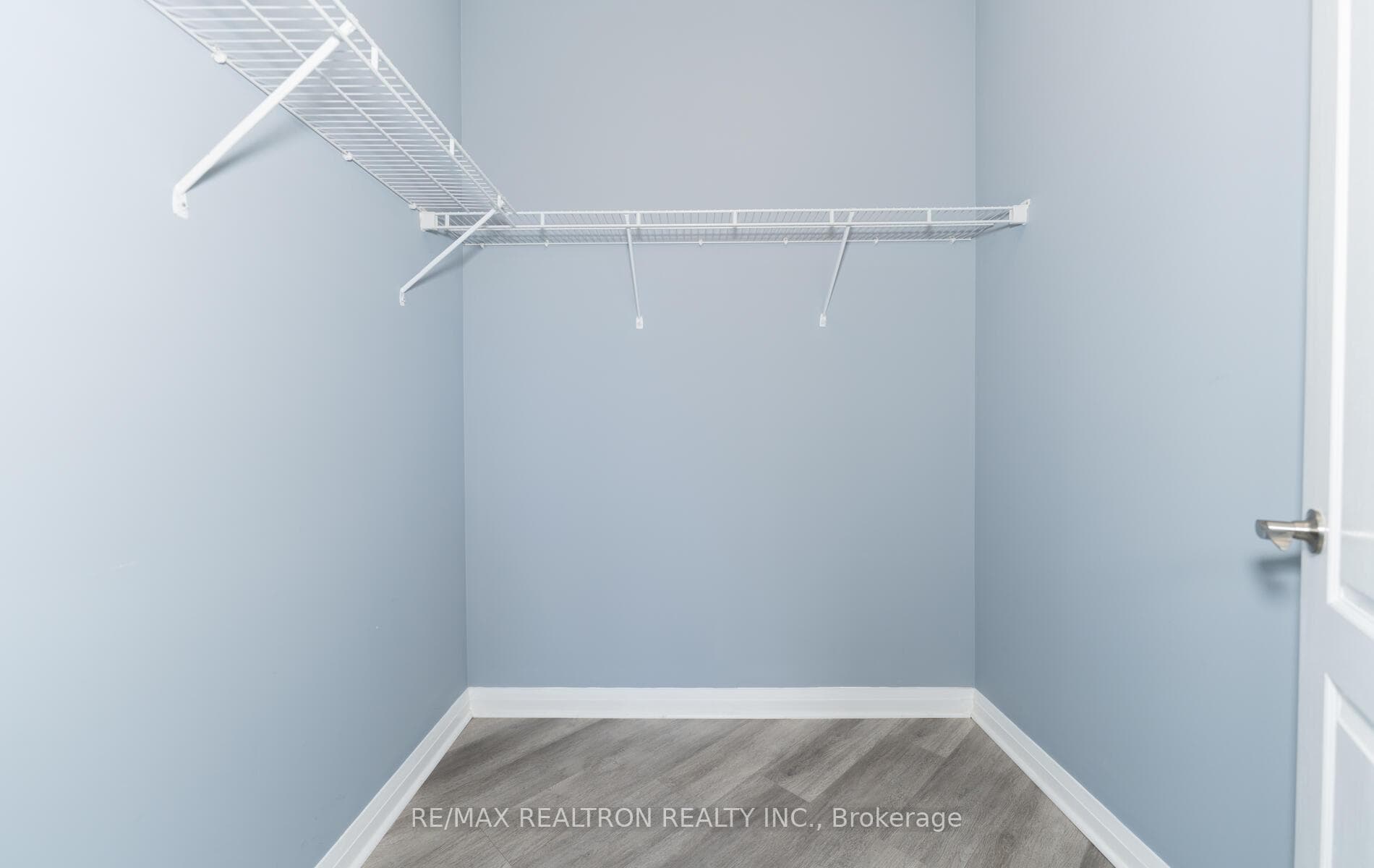 Walk-In Closet in Primary Bedroom