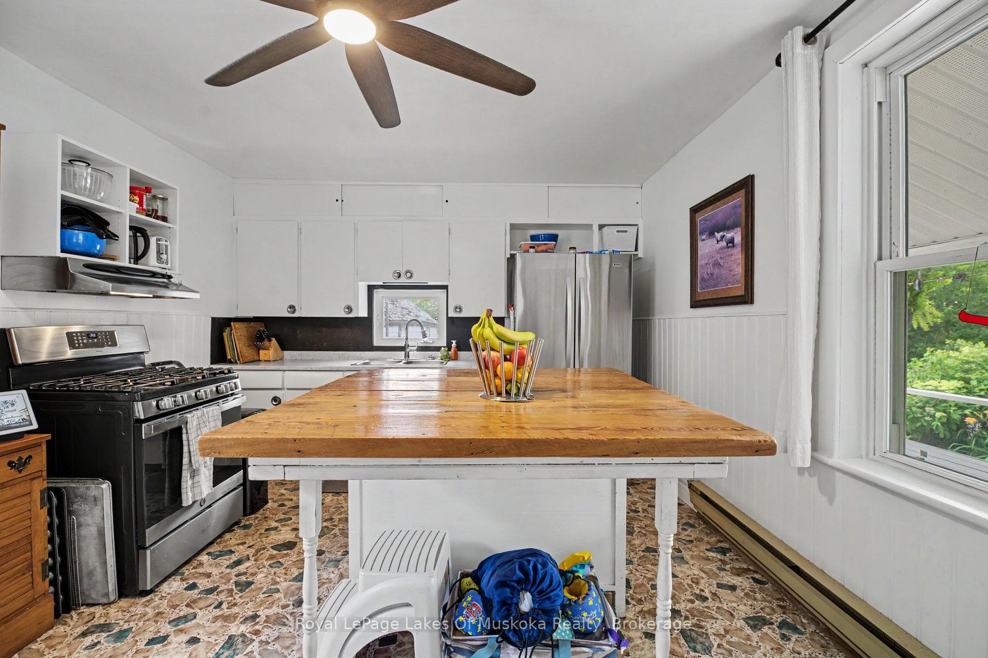 Kitchen, with walkout to the backyard